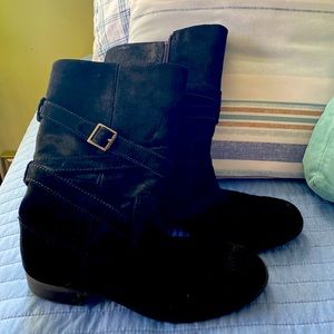 Mid calf suede boots.